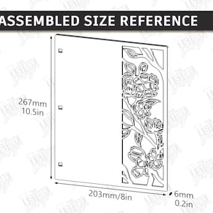 May include: A black and white diagram showing an assembled size reference. The design is a square with a floral cutout on the right side. The dimensions are 10.5 inches high, 8 inches wide, and 0.2 inches thick. The text reads "ASSEMBLED SIZE REFERENCE".