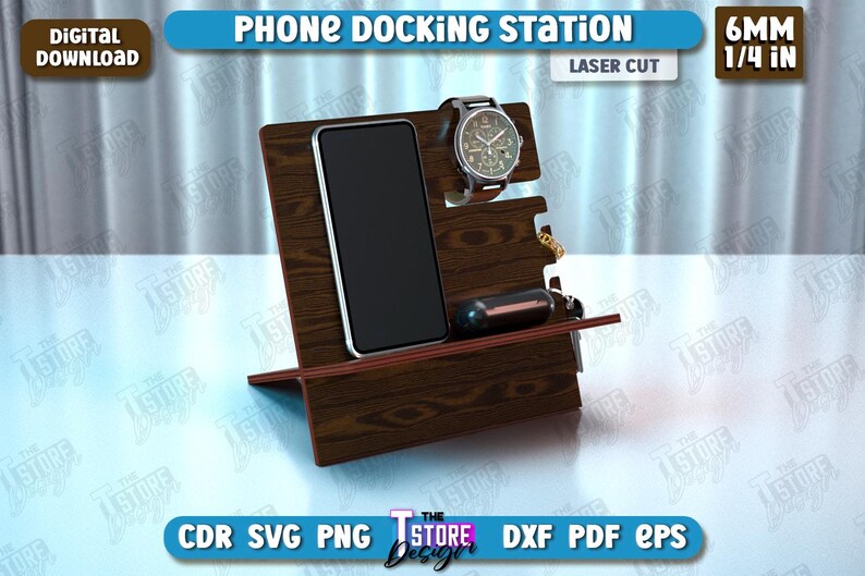 Op de afbeelding: Een houten telefoon laadstation met een gleuf voor een horloge en een klein compartiment voor andere items. Het station is lasergesneden uit 6 mm (1/4 inch) dik hout.