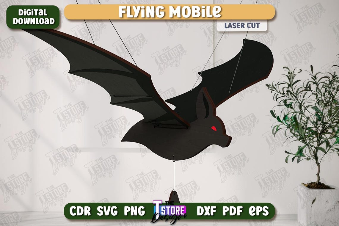 May include: A black bat-shaped flying mobile with red eyes, laser cut from wood. The mobile is suspended by thin strings. The words "FLYING MOBILE" and "LASER CUT" are visible. The image also includes the text "AGEN TOTO MACAU DOWNLOAD".