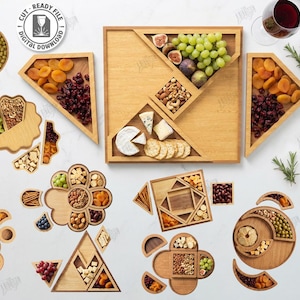 May include: A collection of wooden serving trays in various geometric shapes, filled with an assortment of snacks, including grapes, dried apricots, nuts, and cheese. The image also includes a glass of red wine and text that says "CUT READY FILE DIGITAL DOWNLOAD".