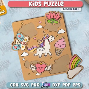 May include: Wooden laser-cut kids puzzle featuring a unicorn, butterfly, ice cream cone, rainbow, and heart with wings. The puzzle has a light brown base with colorful cut-out shapes. The text "KIDS PUZZLE" is at the top.