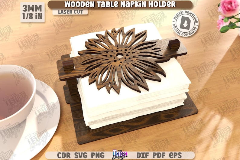 May include: Wooden table napkin holder with a laser-cut sunflower design. The holder is made of dark brown wood and holds a stack of white napkins. The text "WOODEN TABLE NAPKIN HOLDER" is visible.