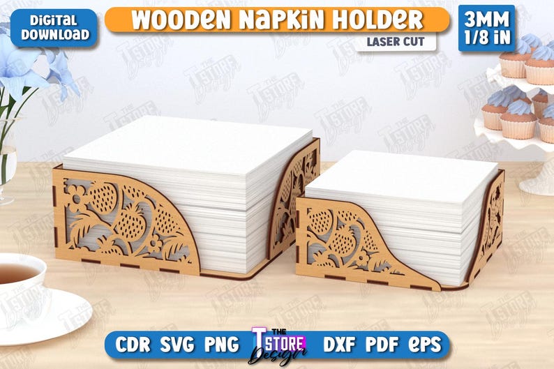 May include: A wooden napkin holder with a laser cut design of strawberries and leaves. The holder is 3mm thick and is shown holding a stack of white napkins. The text "WOODEN NAPKIN HOLDER" and "LASER CUT" is visible in the image.