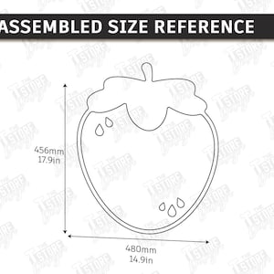 May include: A line drawing of a strawberry with dimensions. The strawberry outline is 17.9 inches (456mm) tall and 14.9 inches (480mm) wide. The text "ASSEMBLED SIZE REFERENCE" is at the top.