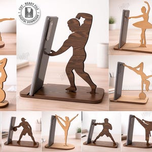 May include: Wooden phone stands with laser-cut designs. The stands feature various figures, including a gymnast, a ballet dancer, and a weightlifter. The material width is 3mm. The image also includes the text "CUT READY FILE DIGITAL DOWNLOAD".