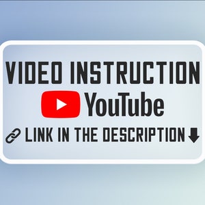 May include: White rectangle with rounded corners containing the text "VIDEO INSTRUCTION" and a red YouTube play button. Below the button is the text "YouTube" and below that is the text "LINK IN THE DESCRIPTION" with a chain link icon to the left and a downward arrow to the right.
