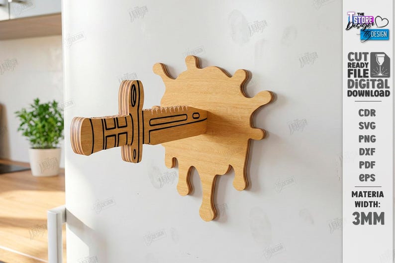 Puede incluir: Decoraci&oacute;n de pared de madera con un dise&ntilde;o de cuchillo que perfora una salpicadura de madera. El cuchillo y la salpicadura son de madera marr&oacute;n claro con detalles negros. Incluye el texto "CUT READY FILE DIGITAL DOWNLOAD".