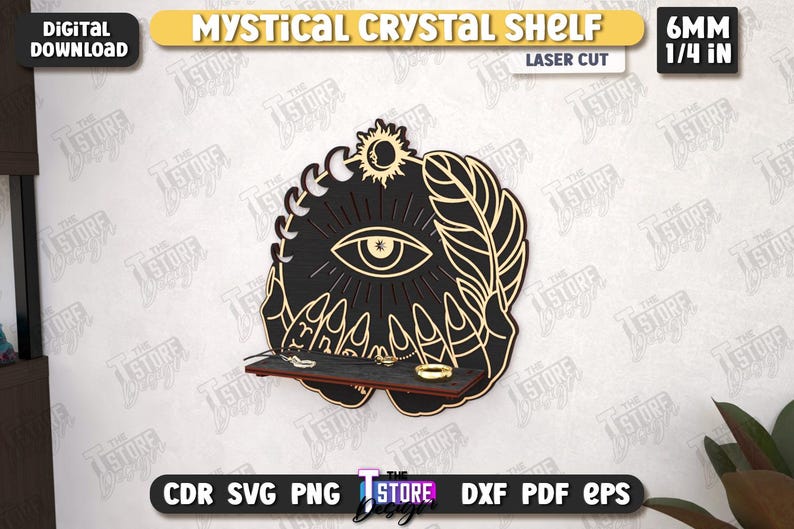 May include: Black laser-cut wooden shelf with a mystical design. The shelf features an eye, sun, moon, feather, and hands. It is 1/4 inch thick and includes a small shelf to hold crystals or jewelry. The text "MYSTICAL CRYSTAL SHELF" is at the top.