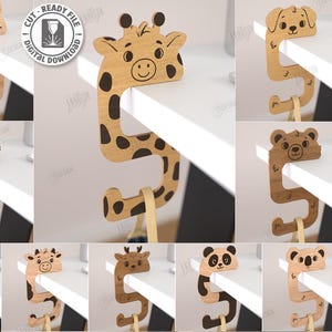 May include: Wooden animal-shaped desk clips in various designs, including a cat, giraffe, dog, and bear. The laser-cut designs are compatible with any material thickness. The image also includes the text "CUT READY FILE DIGITAL DOWNLOAD".
