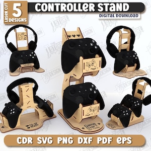 May include: Five laser-cut controller stands, designed to hold a game controller and headset. The stands are made of light-coloured wood and feature black controllers. The text "CONTROLLER STAND" and "DIGITAL DOWNLOAD" are visible.