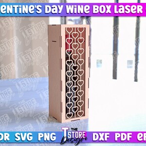 May include: Laser cut wine box with a heart design. The box is made of wood and is 3 mm thick. The box is designed to hold a standard bottle of wine.