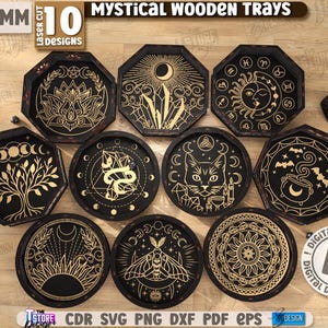 Könnte beinhalten: Eine Sammlung von zehn lasergeschnittenen Holztabletts mit mystischen Designs. Die Tabletts sind schwarz mit goldfarbenen, komplizierten Mustern, darunter eine Lotusblume, Sonne, Mond und Katze. Der Text "MYSTICAL WOODEN TRAYS" steht oben. Der Text "3MM" und "10 DESIGNS" ist ebenfalls sichtbar.