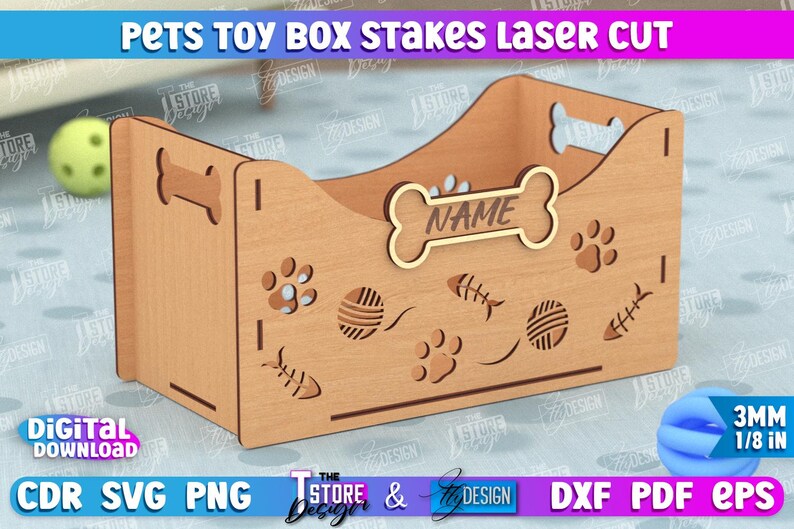 May include: Laser cut wooden pet toy box with a bone-shaped cutout for a name. The box has a decorative design with paw prints, fish bones, and yarn balls. The box is 3 mm thick.