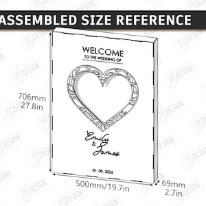 May include: A white wedding sign with a heart-shaped cutout, measuring 27.8 inches high, 19.7 inches wide, and 2.7 inches deep. The sign includes the text "Welcome to the Wedding of" and the names "Emily & James" with the date 01.05.2026.