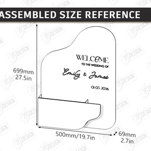 May include: A white wedding sign with the text "WELCOME TO THE WEDDING OF Emily & James" and the date 01.05.2036. The sign is 27.5 inches tall, 19.7 inches wide, and 2.7 inches deep.