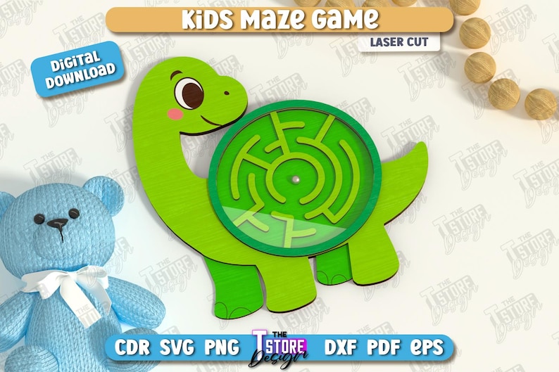 May include: A green wooden dinosaur-shaped maze game for kids. The maze is circular and has a clear cover. The text "Kids Maze Game" and "Laser Cut" are at the top. A blue teddy bear is in the background. Digital download available.