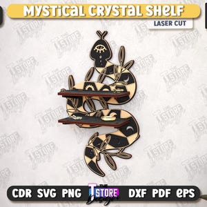 May include: A laser-cut, black and tan Mystical Crystal Shelf, 6mm (1/4 in) thick, with two shelves. The shelf is shaped like a stylized snake with geometric patterns and celestial accents. The text "Mystical Crystal Shelf" is at the top.