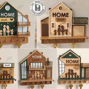 May include: Wooden key holder in the shape of a house, with the word "HOME" and a family silhouette. Includes a shelf and key hooks. The design is available in 5 styles. The material width is 3mm.