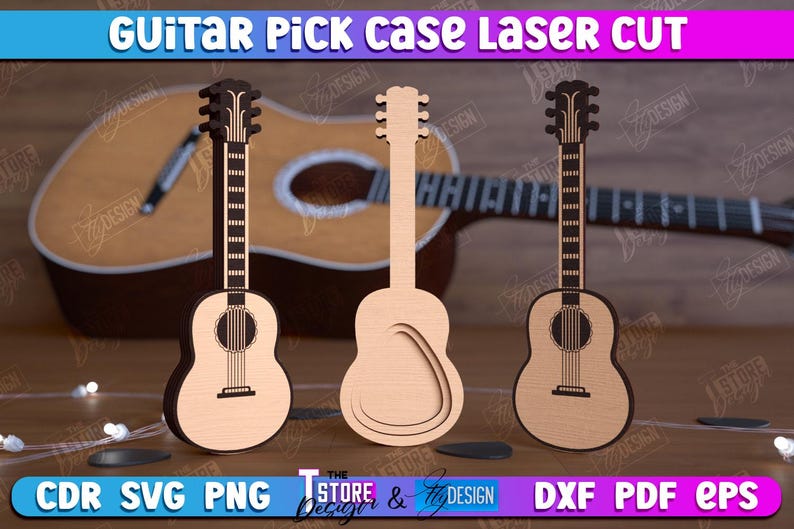 May include: Three laser cut guitar pick cases. The cases are shaped like guitars and are made of wood. The cases are on a brown surface with a guitar in the background.