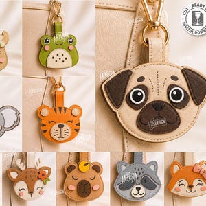 May include: A digital download set of 10 laser cut animal keychain designs featuring a pug, frog, koala, tiger, fox, deer, bear, raccoon, and sheep. The files are provided in CDR, SVG, PNG, DXF, PDF, and EPS formats for use with various material thicknesses.
