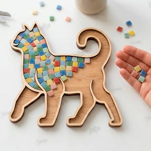 May include: Wooden dog-shaped mosaic art piece with colorful square tiles. The dog is made of light brown wood, and the mosaic tiles are in shades of blue, green, yellow, and pink. The image also includes text that says "CUT READY FILE DIGITAL DOWNLOAD".