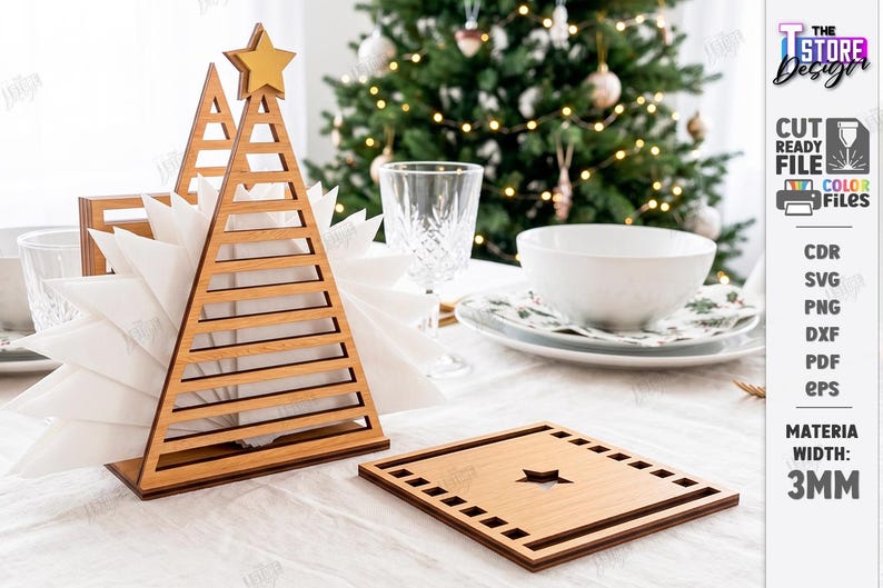 May include: A wooden napkin holder shaped like a Christmas tree with a star topper, holding white napkins, alongside a square wooden coaster with a star cutout. The design features a 3mm material width, with digital file formats listed.
