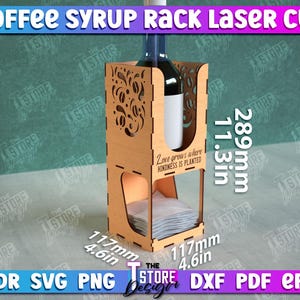 May include: Laser cut wooden rack for holding coffee syrup bottles. The rack is 11.3 inches tall and 4.6 inches wide. It has a quote that reads "Love grows where kindness is planted".