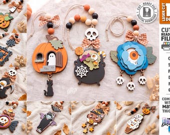 May include: A collection of ten laser-cut wooden Halloween ornaments featuring designs like a pumpkin with a ghost, a black cauldron, a blue flower with an eye, a skull, a cat, a vampire, and a candy corn. Each piece includes wooden beads and a plaid bow.