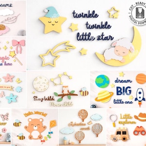 May include: A selection of 10 laser-cut designs with a whimsical theme. Designs include a sleeping deer, a star with a sleeping cap, a unicorn, a magic wand, a rabbit, flowers, a moon, a bear, balloons, and a car. Text includes "Sweet Dreams", "Magic happens here", and "dream BIG little one".