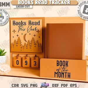 Puede incluir: Seguimiento de libros de madera con el texto "Books Read This Year" y "Book of the Month". El dise&ntilde;o incluye una escena de bosque y una luna. El rastreador tiene una secci&oacute;n para mostrar el n&uacute;mero de libros le&iacute;dos. Descarga digital incluida.