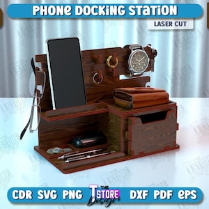 Op de afbeelding: Een houten telefoon laadstation met een lade, een plank voor een telefoon en een horlogehouder. Het station is gemaakt van 6 mm (1/4 inch) dik hout en is lasergesneden.