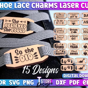 May include: A set of 15 laser cut shoe lace charms with various designs and sayings. The charms are made of wood and have a light brown colour. The charms feature sayings such as "She Believed She Could", "So She Did", "Kick Ass", "Dream It", "Run Fast", "Achieve It", "Be Kind", "New Year", "New Shoes", "Bad", "Ass", "No Excuse", "Do What You Love", "Love What You Do", "You Can Do This", "Never Give Up", and "Do The Work!" The charms also feature paw prints, a dinosaur, and a cat.