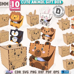 May include: A collection of laser-cut wooden gift boxes in various animal designs, including a lion, bear, penguin, and panda. The boxes are brown with detailed animal faces and are labeled "CUTE ANIMAL GIFT BOX" and "10 DESIGNS". The image also includes the text "DIGITAL DOWNLOAD".