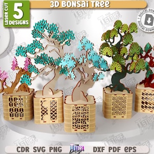 May include: Five laser-cut 3D bonsai tree designs in various colors, including pink, teal, green, and red. Each tree is displayed in a decorative wooden pot. The image includes the text "3D BONSAI TREE" and "5 DESIGNS".