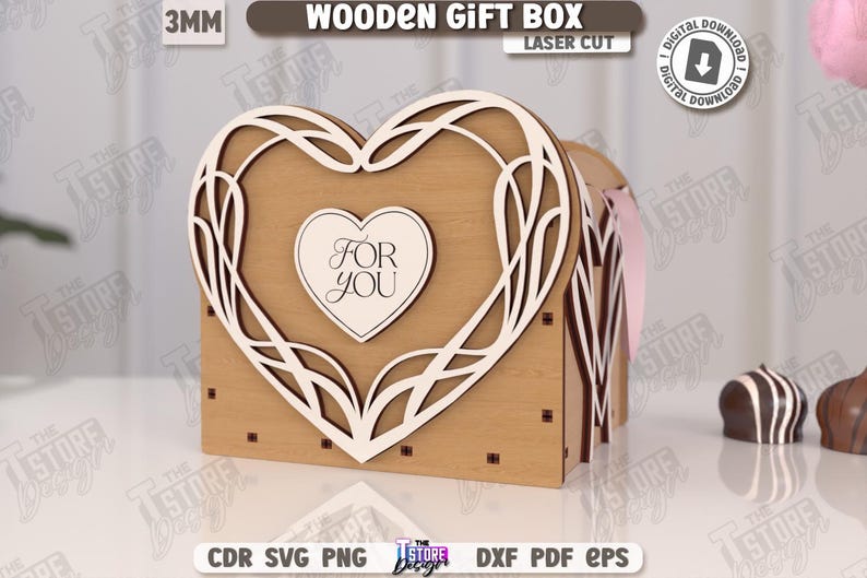 May include: A wooden gift box with a heart-shaped design, laser cut from 3mm wood. The box features a decorative white heart outline and a smaller heart in the center with the words "FOR YOU". The box is a digital download.