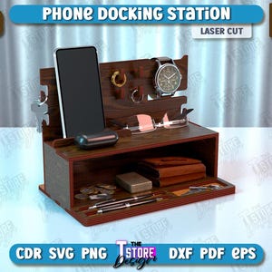 Op de afbeelding: Een houten telefoon laadstation met een compartiment voor opslag. Het station heeft een telefoonhouder, een horlogehouder, een brillenhouder en een ruimte voor sleutels. Het station is gemaakt van 6 mm (1/4 inch) dik hout en is lasergesneden.