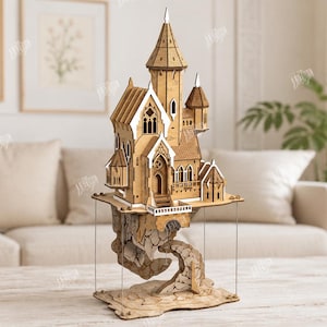 May include: A laser-cut wooden model of a floating castle featuring intricate architectural details, pointed towers, and white accents. The structure rests on a rocky base supported by thin vertical rods, with a material width of 3mm.