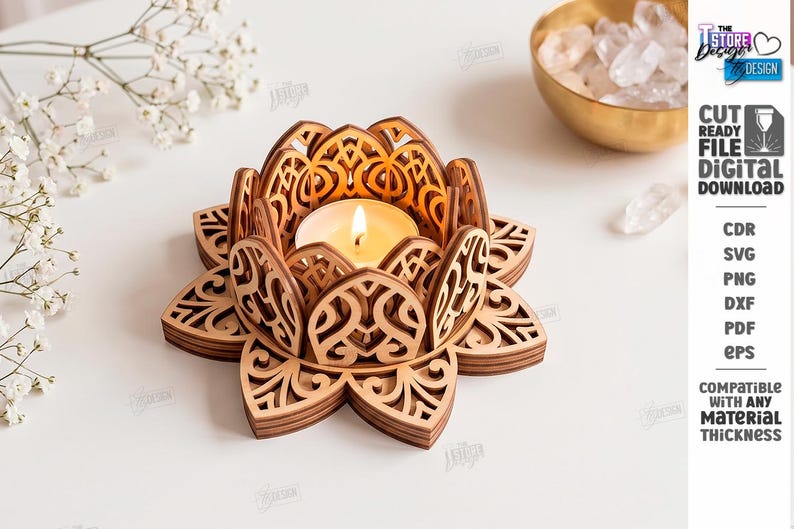 May include: A laser-cut wooden lotus flower candle holder with intricate filigree patterns, holding a lit tea light candle. The text on the right reads: THE STORE DESIGN, CUT READY FILE DIGITAL DOWNLOAD, CDR, SVG, PNG, DXF, PDF, EPS, COMPATIBLE WITH ANY MATERIAL THICKNESS.