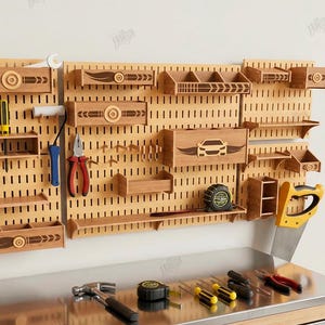 May include: Wooden pegboard with various tools and storage shelves. Includes a saw, pliers, screwdrivers, and a tape measure. The pegboard has a car design and the text "CUT READY FILE DIGITAL DOWNLOAD".