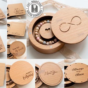 May include: A collection of laser-cut wooden designs for gift boxes and tags. The designs feature phrases such as "Happy Birthday!" and "Always in my Heart." The boxes are round and square, with engraved messages.
