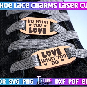 May include: Two wooden shoe lace charms with the text "Do what you love" and "Love what you do" in black lettering. The charms are on a pair of black shoelaces.