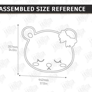 May include: Line drawing of a bear face with a bow, measuring 14.0 inches high and 17.0 inches wide. The text "ASSEMBLED SIZE REFERENCE" is at the top. The image includes the text "CUT READY FILE DIGITAL DOWNLOAD".