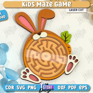 May include: A wooden laser-cut kids' maze game shaped like a bunny with a carrot. The maze is circular with a clear cover. The bunny has pink ears and feet. The text "Kids Maze Game" and "Laser Cut" are visible.