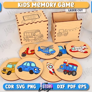 May include: A wooden kids' memory game set with laser-cut designs. The set includes a box, a container, and circular game pieces featuring illustrations of vehicles like a car, helicopter, and train. The text "KIDS MEMORY GAME" is visible.