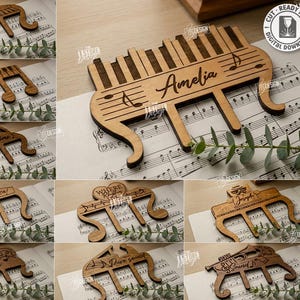 May include: Wooden music-themed decor pieces in various designs, including piano keys and musical notes. One piece is engraved with the name "Amelia". The image also includes text that says "10 Designs" and "Cut Ready File Digital Download".