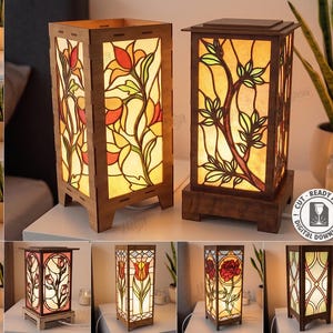 Könnte beinhalten: Eine Sammlung von zehn quadratischen Holzlampendesigns mit lasergeschnittenen Rahmen und lichtdurchlässigen Paneelen mit Blumen-, Geometrie- und Himmelsmustern. Die digitalen Dateien sind für eine Materialstärke von 3 mm ausgelegt.