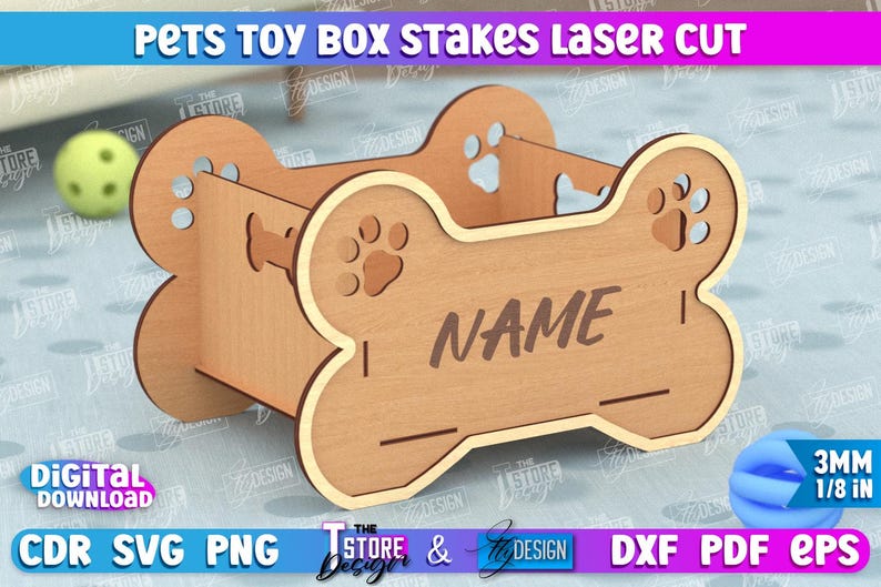 May include: Laser cut wooden dog bone shaped toy box with a slot for a name. The box is made of light brown wood and has a 3mm (1/8 inch) thickness.