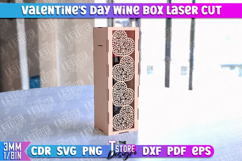 May include: A laser cut wooden wine box with a Valentine's Day theme. The box has a decorative design of four hearts with intricate details. The box is made of 3mm thick wood.