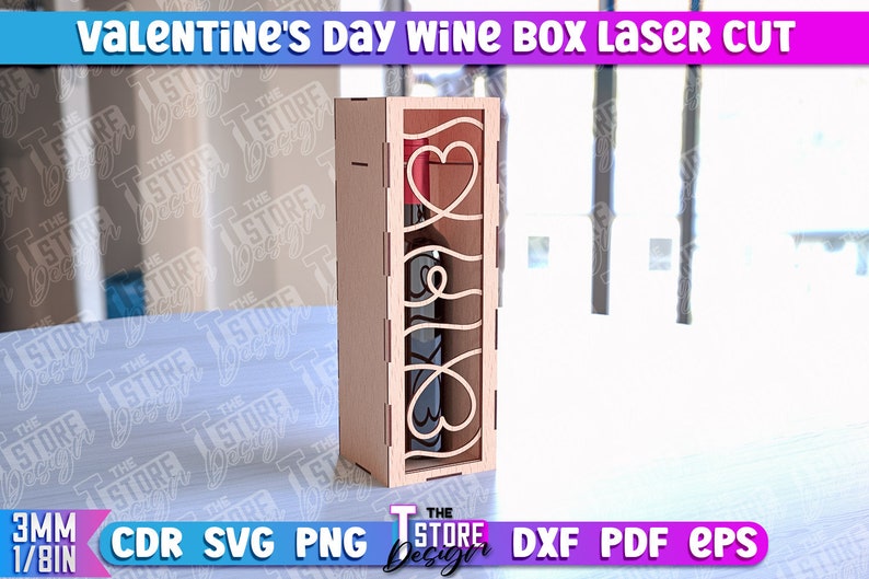 May include: Laser cut wine box with a heart design. The box is made of wood and is designed to hold a standard-sized wine bottle. The box is perfect for a Valentine's Day gift.