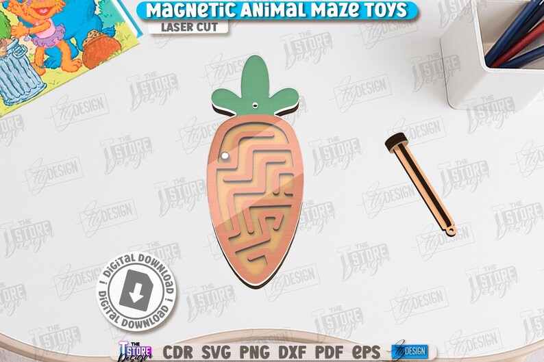 May include: A laser-cut wooden carrot-shaped magnetic maze toy with a green top and a light brown maze design. Includes a wooden stylus and the text "MAGNETIC ANIMAL MAZE TOYS" and "LASER CUT". A digital download icon is also present.